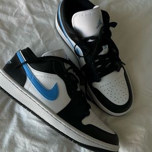 New! Jordan 1 Low Black University Blue with box and tags. All women sizes